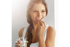 Image Lady taking a pill square